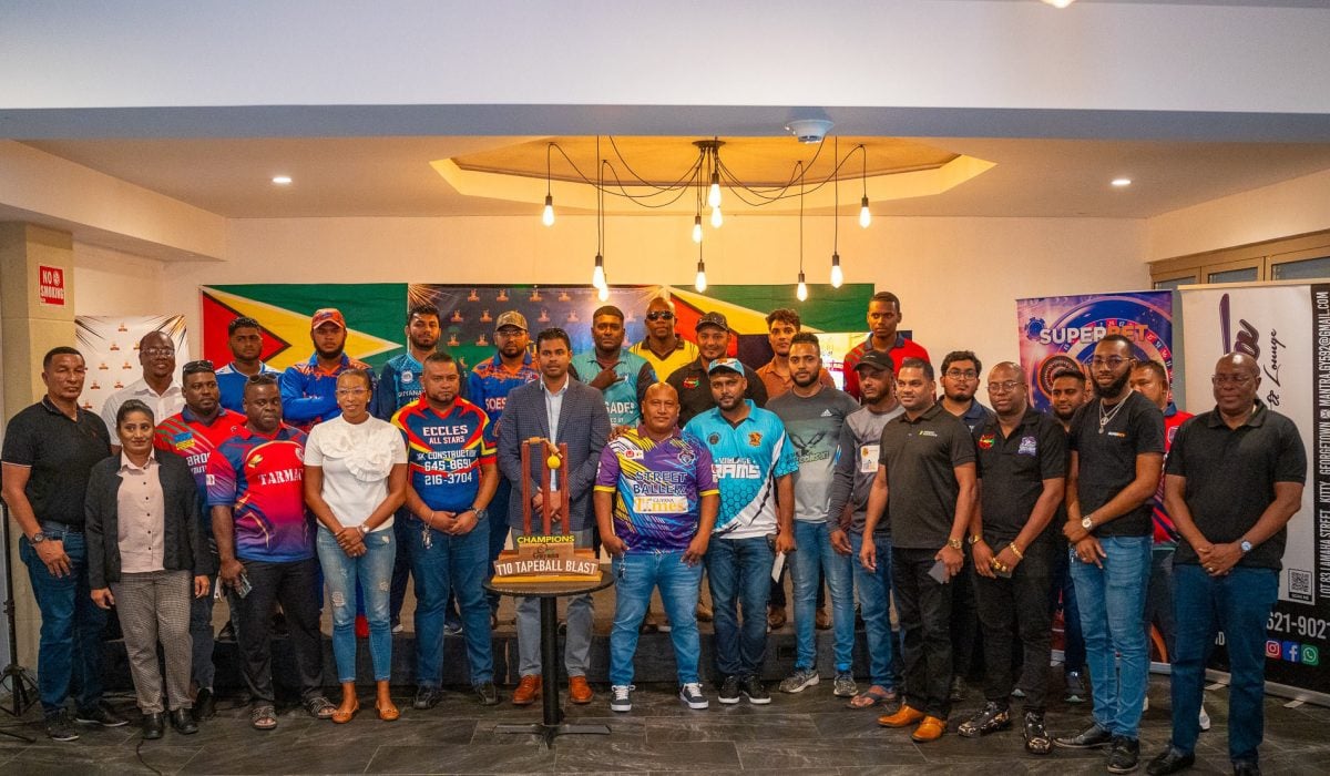 Minister of Culture, Youth, and Sport Charles Ramson Jr. (centre) posing alongside representatives of the competing teams and tournament officials at the official launch of the Kares ‘One Guyana’ T10 Tape-ball Cricket Blast