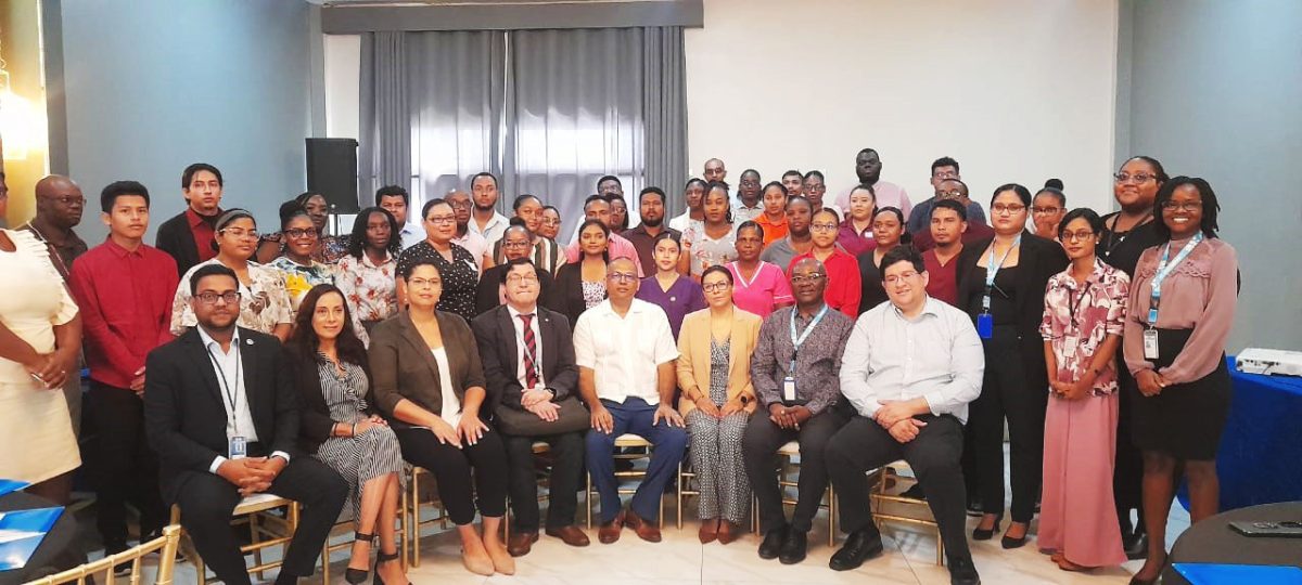 Minister of Health (centre) with members PAHO/WHO at the Flu Workshop opening ceremony  