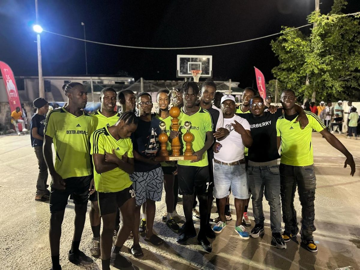 The victorious Stabroek Ballers outfit receives their prizes, inclusive of the championship trophy, after winning the Mocha Village Cup ‘Soft Shoe’ Football Tournament
