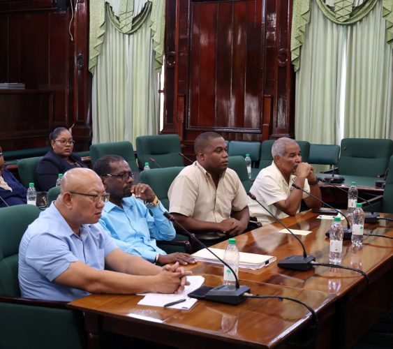 REO Kerwin Ward (second from left, front row) and the Region 7 team during the PAC meeting.