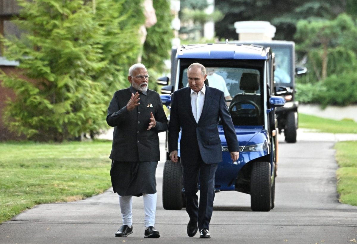 Russia's President Vladimir Putin (right) and India's Prime Minister Narendra Modi walk during their meeting at the Novo-Ogaryovo state residence near Moscow, Russia July 8, 2024. Sputnik/Sergei Bobylyov/Pool via REUTERS