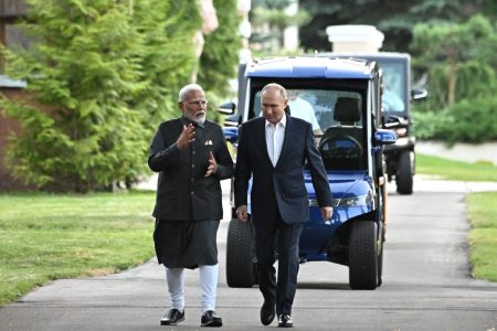 Russia's President Vladimir Putin (right) and India's Prime Minister Narendra Modi walk during their meeting at the Novo-Ogaryovo state residence near Moscow, Russia July 8, 2024. Sputnik/Sergei Bobylyov/Pool via REUTERS