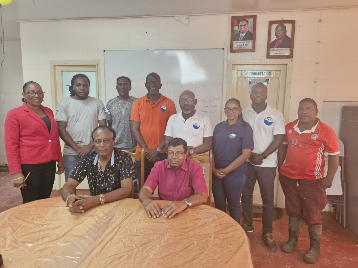 GWI CEO Shaik Baksh (seated at right) with stakeholders of the Kwakwani Utilities Incorporated (GWI photo)