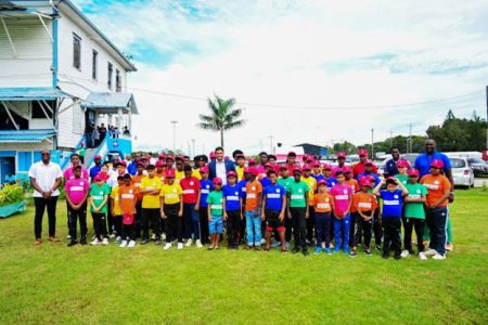 Minister of Culture, Youth and Sport, Charles Ramson with youths at the launch of Malteenoes Sports Club cricket academy (DPI photo)