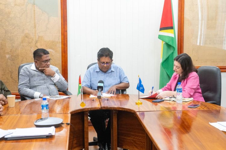 Finance Minister Dr Ashni Singh (centre) signed on behalf of Guyana while Resident Representative, Diletta Doretti (right) signed on behalf of the World Bank. (Ministry of Finance photo)