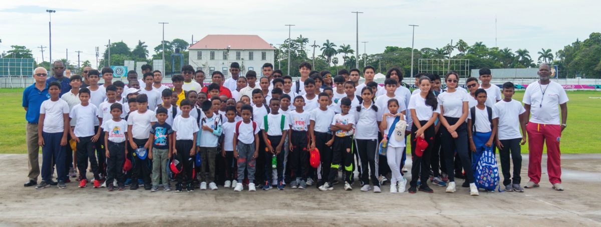 The coaches, GCC President and some of the participants posed for a group photo ahead of the start of the two-week camp.