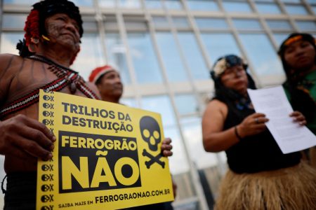 Munduruku Indigenous people stand together before filing a letter of rupture with the Ferrograo railway working group at the Ministry of Transport in Brasilia, Brazil, July 29, 2024. REUTERS/Adriano Machado