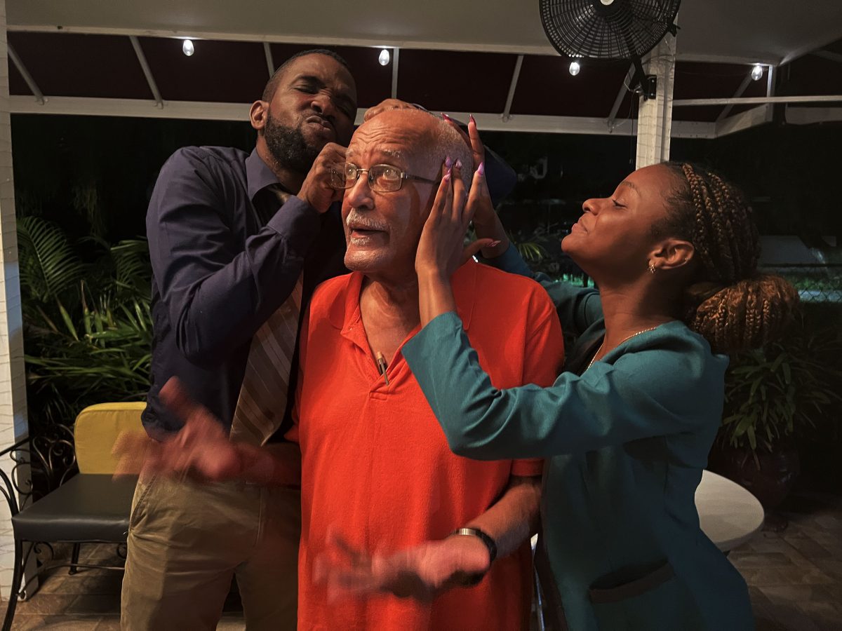 Ron Robinson, Mark Luke-Edwards and an
actress during a scene in the upcoming production