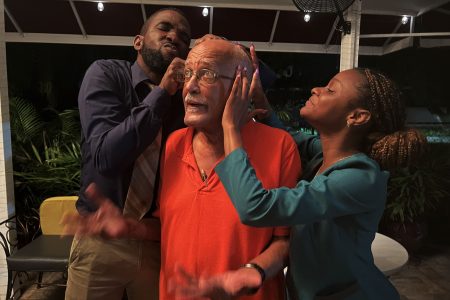 Ron Robinson, Mark Luke-Edwards and an
actress during a scene in the upcoming production