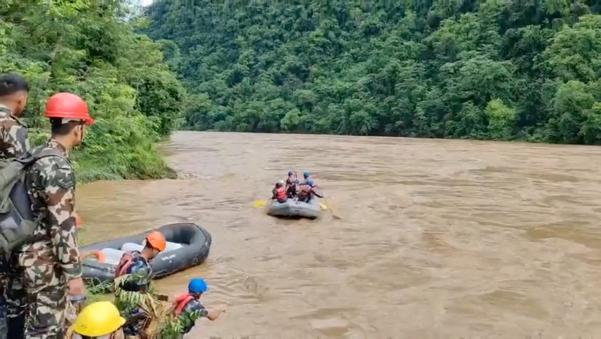 Rescuers work in the aftermath of a landslide at a location given as Chitwan District, Bagmati Province, Nepal, in this screen grab obtained from a handout video released on July 12, 2024. Armed Police Force Nepal via Facebook/Handout via REUTERS