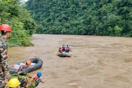 Rescuers work in the aftermath of a landslide at a location given as Chitwan District, Bagmati Province, Nepal, in this screen grab obtained from a handout video released on July 12, 2024. Armed Police Force Nepal via Facebook/Handout via REUTERS