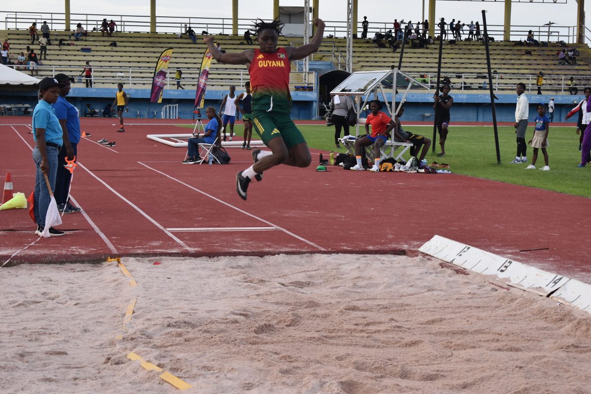 Robert Marcus of Police grabs gold in the long jump boys U20, leaping 7.09m. (Zaheer Mohamed photo) 