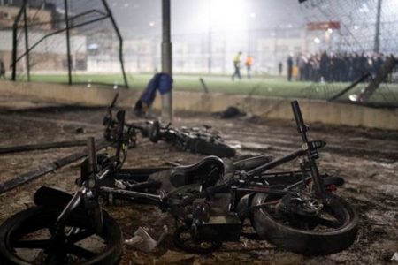 Residents rush to help injured children moments after a rocket attack hit a soccer field in the Druze town of Majdal Shams in the Israeli-controlled Golan Heights, Saturday, Jul 27, 2024. (Photo: AP Photo/Hassan Shams)