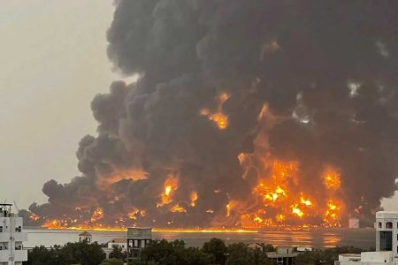 A handout picture obtained from Yemen's Huthi Ansarullah Media Center show a huge column of fire erupting following reported strikes by Israeli fighter jets in the Yemeni rebel-held port city of Hodeidah on Saturday. Ansarullah Media Center/AFP via Getty Images