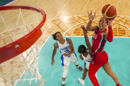 A'ja Wilson (right) of the USA attempts a jump shot against France during the women's basketball final