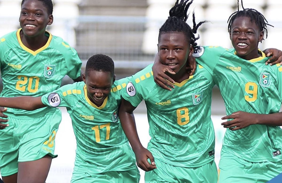 Several members of the Golden Jaguars celebrate after scoring
against the Cayman Islands in the CFU Boy’s U-14 Challenge Series