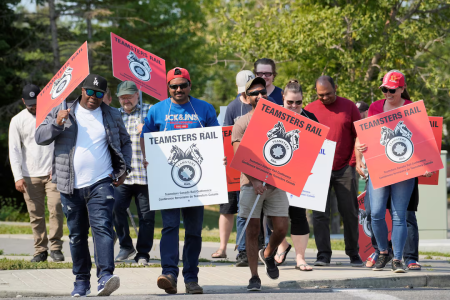 Teamsters union workers picket Canadian Pacific Kansas City (CPKC) headquarters after being locked out by the company in Calgary, Alberta, Canada, August 23, 2024.