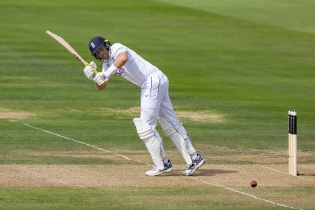 Joe Root of England scores through the leg-side en route to his 143.
