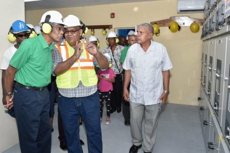 President David Granger (left) on a tour of the new Bartica power station in 2019.
