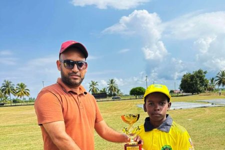 Joseph Bholo receives the Man of the Match award.