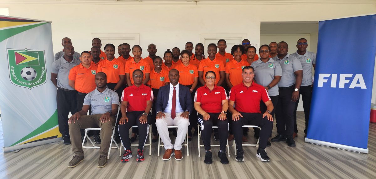 Newly certified members of the referee fraternity pose for the camera following the conclusion of the FIFA training programme