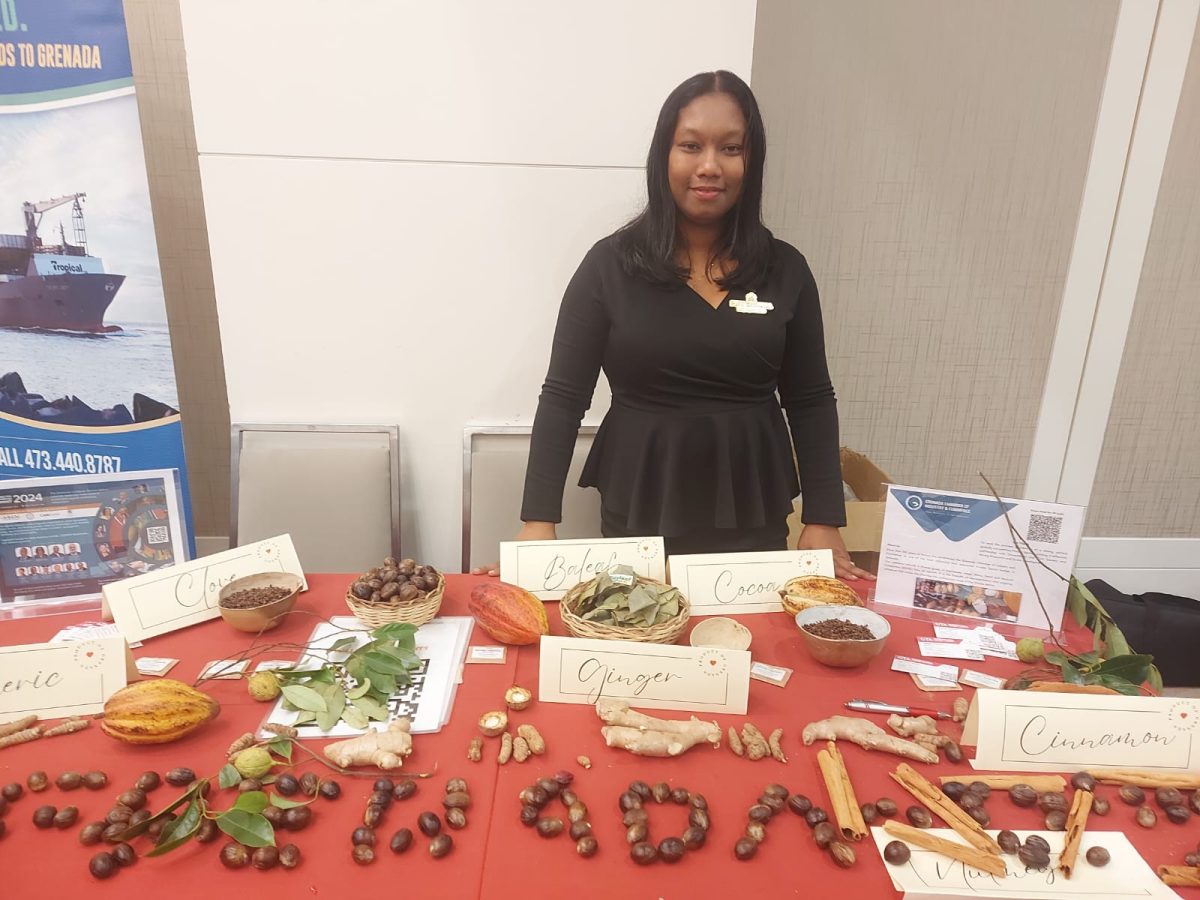 Melinda Tekesford, Project Lead for the Grenada Tourism Authority displaying Grenadian spices