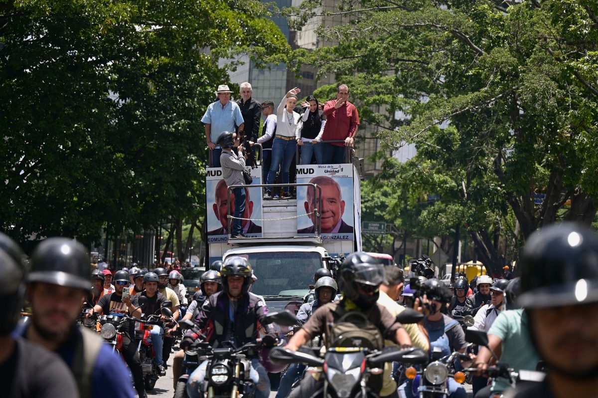 Venezuelan opposition leader Maria Corina Machado leads a march amid the disputed presidential election, in Caracas, Venezuela, August 17, 2024. REUTERS/Gaby Oraa