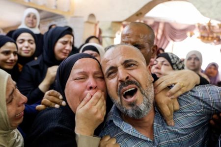 Mourners react during the funeral of Rashid Al-Sadeh, a Palestinian who was killed during an Israeli settlers’ attack in the village of Jeit, near Qalqilya, in the Israeli-occupied West Bank August 16, 2024.