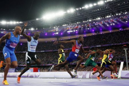 Noah Lyles (3rd from left) prevails over Jamaican Kishane Thompson by five thousandths of a second to win the men’s 100m at the 2024 Paris Olympics
