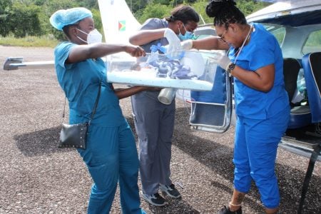 The newborn being prepped to board the aircraft (a Linden Hospital Complex photo)