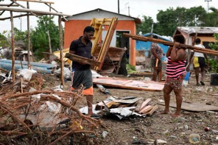 Picking up the pieces Jamaica cleans up after Beryl