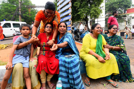 Relatives of the victims of a blast at the privately-held Escientia Advanced Sciences, mourn outside the King George Hospital mortuary in Visakhapatnam, India, August 22, 2024.