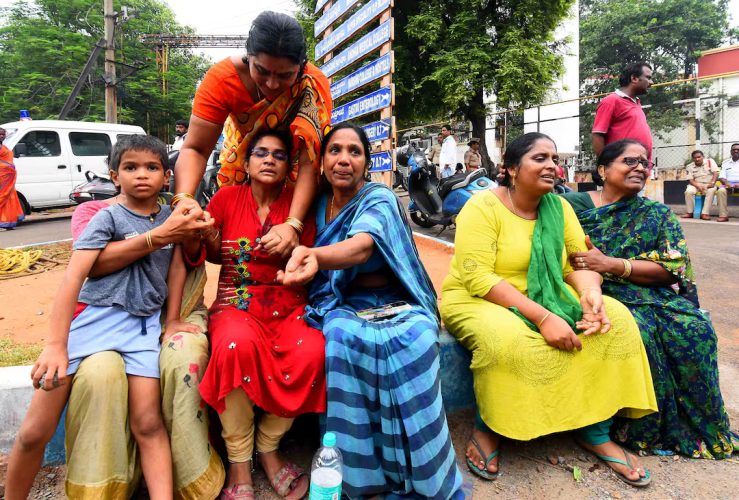 Relatives of the victims of a blast at the privately-held Escientia Advanced Sciences, mourn outside the King George Hospital mortuary in Visakhapatnam, India, August 22, 2024.