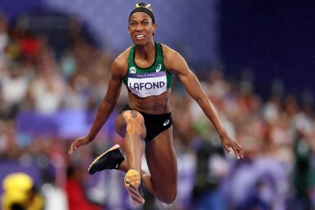 Thea LaFond of Dominica leaps to the nation’s first ever medal as she captures the women’s triple jump