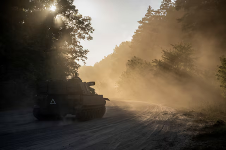 Ukrainian servicemen ride a M109 Paladin self-propelled howitzer, amid Russia’s attack on Ukraine, near the Russian border in Sumy region, Ukraine August 16, 2024.