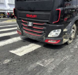 Truck stopped on pedestrian crossing