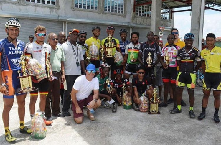 The overall category winners of a
previous Regan Rodrigues Memorial Cycling Road Race pose for a photo.
