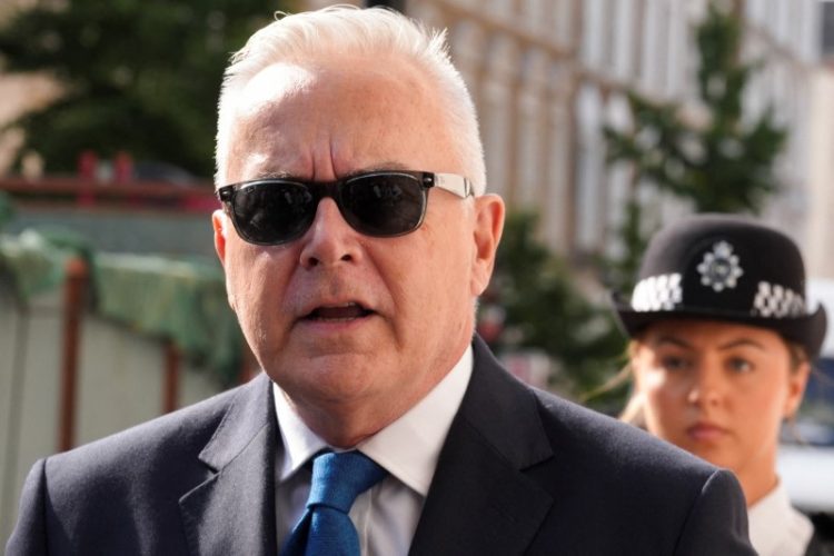 FILE PHOTO: Former BBC news presenter Huw Edwards walks outside Westminster Magistrates' Court, ahead of his court hearing after being charged with indecent child picture crimes, in London, Britain, July 31, 2024. REUTERS/Maja Smiejkowska/File Photo