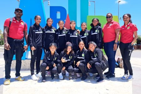 The Guyana U15 Girls National squad posed for a photo along with their coaches upon arriving in Aruba yesterday. They will head into action on Tuesday (August 6) with their first match against Anguilla. 
