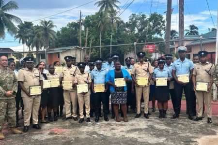 The trainers with the members of the police force (Police photo)