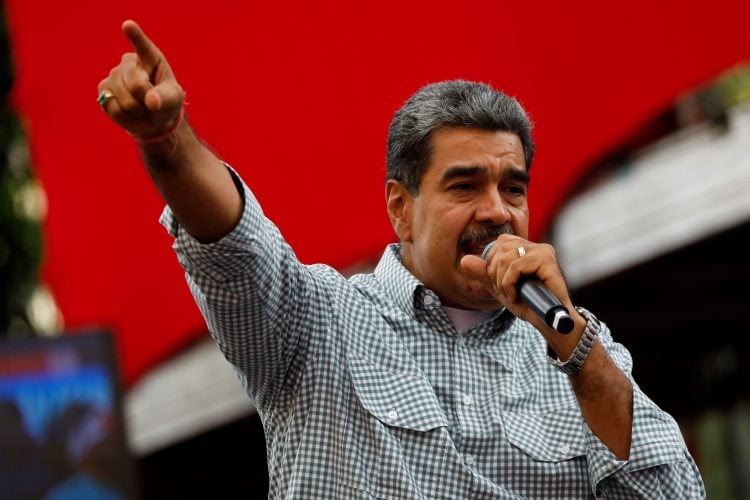 FILE PHOTO: Venezuelan President Nicolas Maduro delivers a speech during a rally to celebrate the results of last month's presidential election, in Caracas, Venezuela August 28, 2024. REUTERS/Fausto Torrealba/File Photo