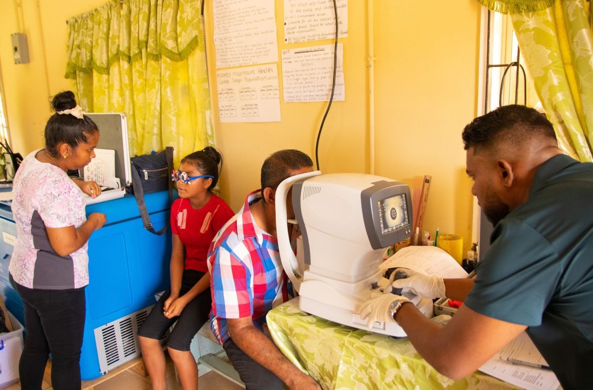 A team from the Ministry of Health yesterday visited the Monkey Mountain Village, (Potaro-Siparuni), where scores of residents turned out for eye testing and cervical cancer screening services. Senior citizens and children received $2,000 vouchers for eye testing, with an additional $15,000 voucher available if they need spectacles.
Women between 21- 65 years of age received vouchers valued at $8000 which covers the cost of screening for cervical cancer.  Additionally, dental care services were also provided.  (Ministry of Health photo)
