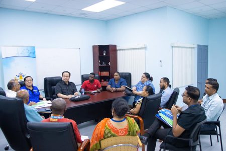 Minister of Health Dr Frank Anthony and others at the meeting. (Ministry of Health photo)