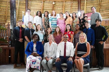 The new volunteers standing (Ministry of Education photo)