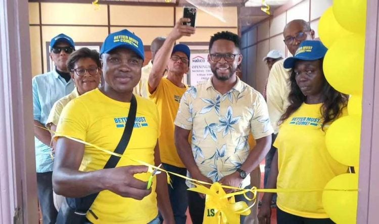 The Alliance For Change (AFC) yesterday opened its Region 10 office in Linden. AFC Lader Nigel Hughes and his wife Cathy Hughes, who is also a party official, are seen with other as the opening.