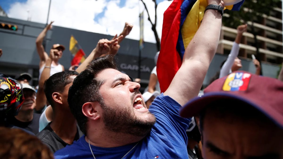 Venezuelans protest against President Nicolas Maduro’s re-election in a disputed July 28 vote [Leonardo Fernandez Viloria/Reuters]