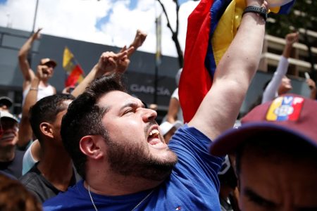 Venezuelans protest against President Nicolas Maduro's re-election in a disputed July 28 vote [Leonardo Fernandez Viloria/Reuters]