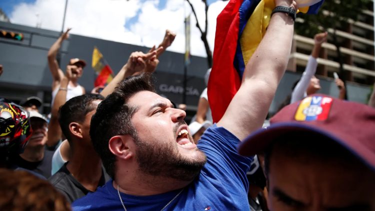 Venezuelans protest against President Nicolas Maduro's re-election in a disputed July 28 vote [Leonardo Fernandez Viloria/Reuters]