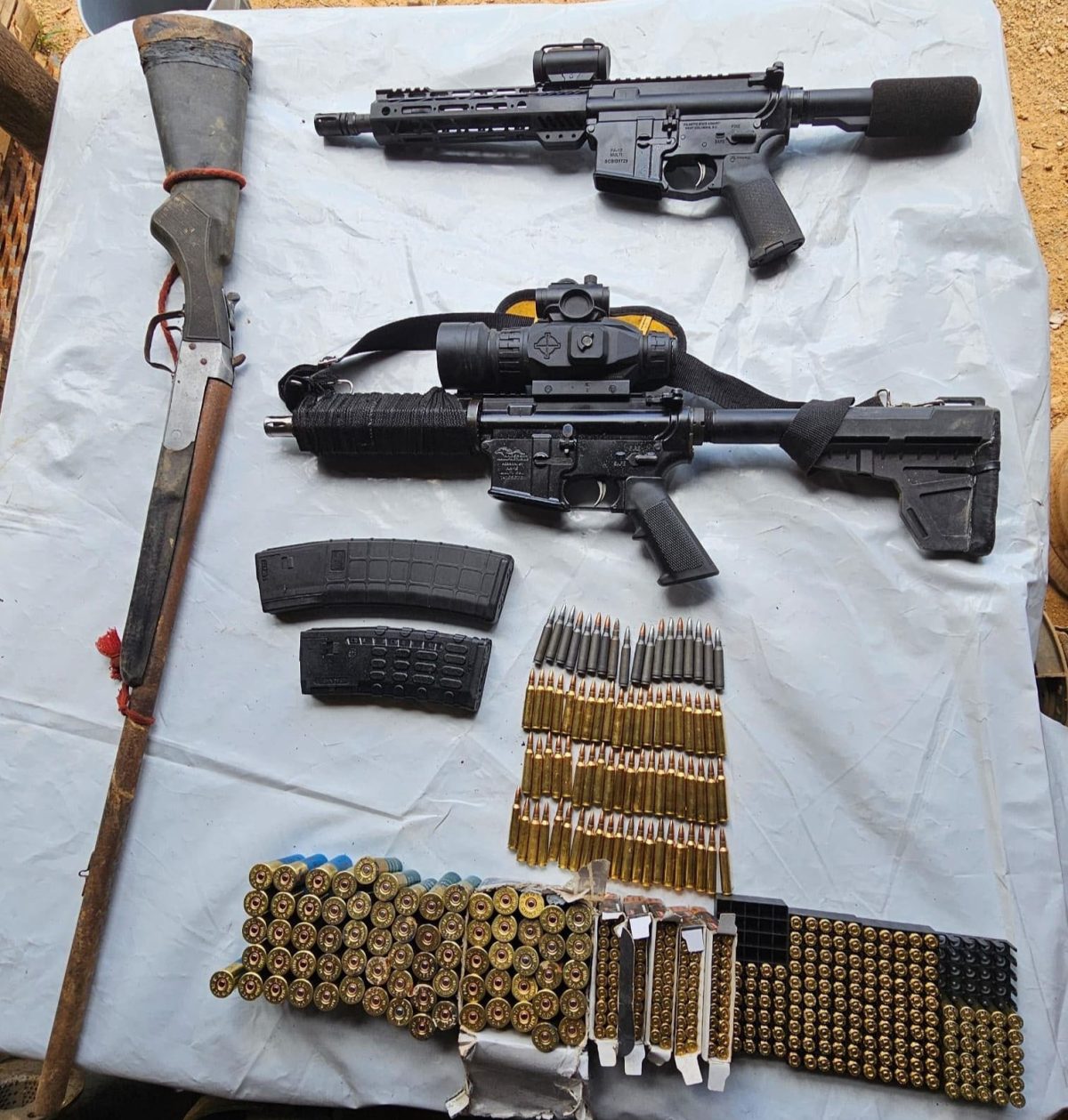 The weapons and ammunition seized (Police photo)