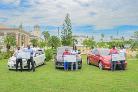 The winners with their million-dollar cheques (GBTI photo)
